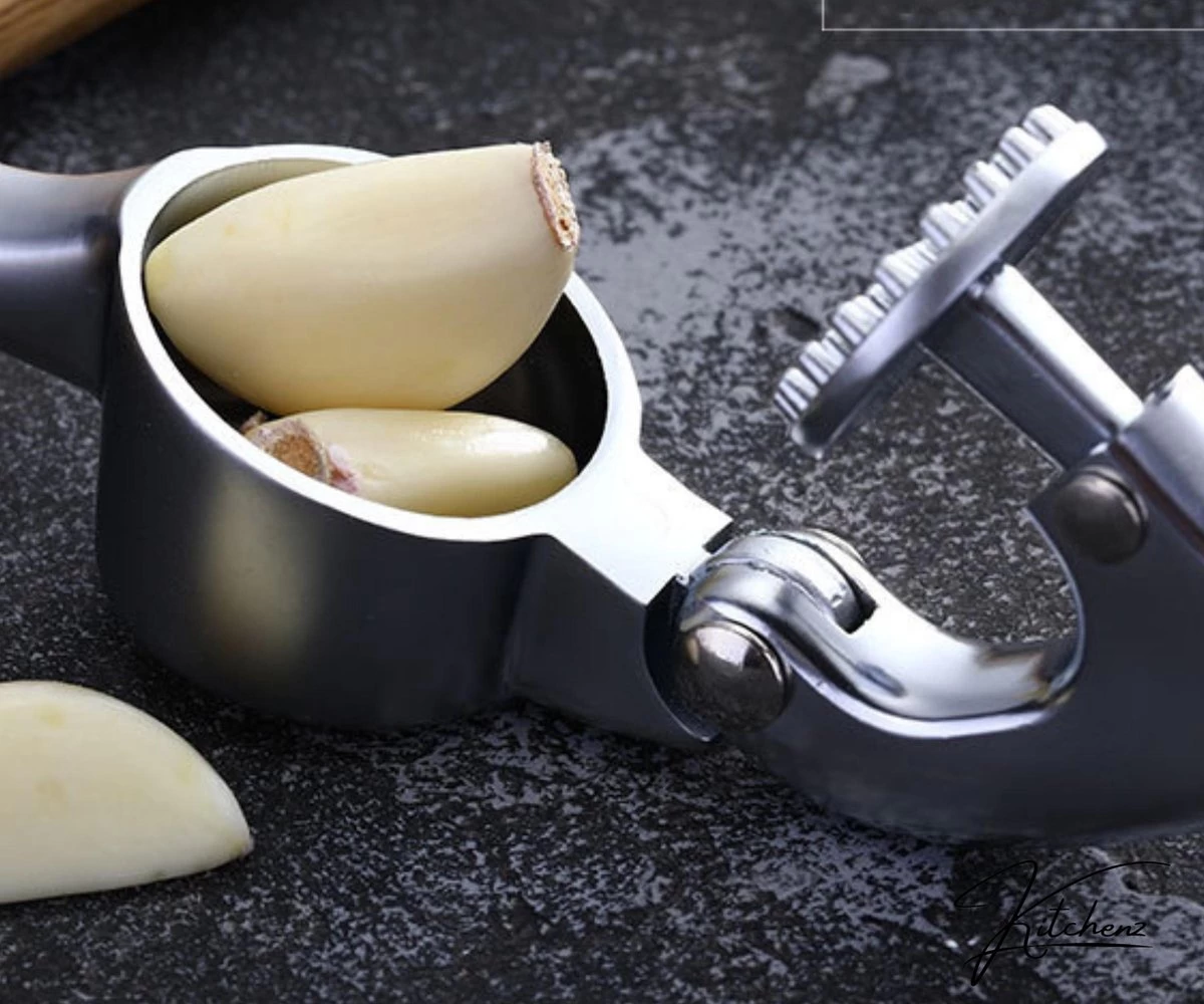 Knoflookpers - Luxe Knoflookpers - Stevige Knoflookpers - Knoflookpers RVS - Roestvrijstaal 6 Knoflookpers - Luxe Knoflookpers - Stevige Knoflookpers - Knoflookpers RVS - Roestvrijstaal - Afbeelding 4