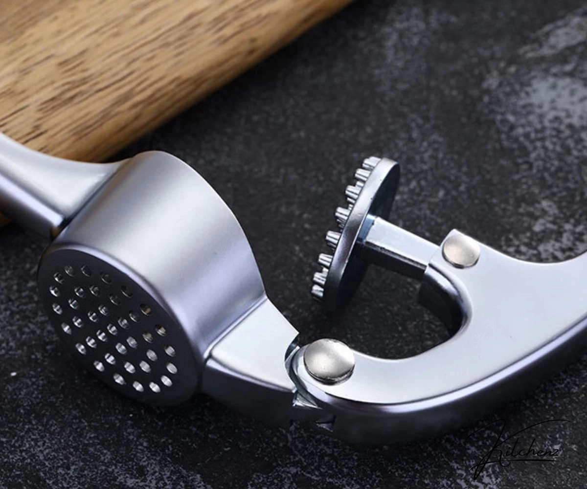 Knoflookpers - Luxe Knoflookpers - Stevige Knoflookpers - Knoflookpers RVS - Roestvrijstaal 8 Knoflookpers - Luxe Knoflookpers - Stevige Knoflookpers - Knoflookpers RVS - Roestvrijstaal - Afbeelding 6